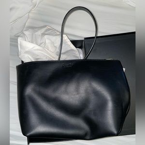 Brand new in box with tags River City leather bag
